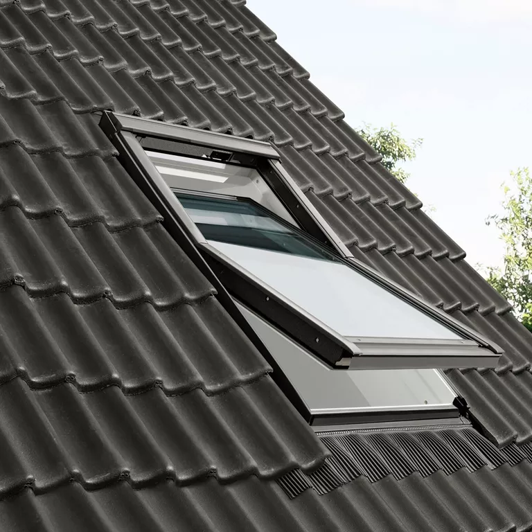 Velux window in slate roof